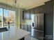 Modern kitchen features stainless steel appliances and an island at 1225 E 34Th St # Csw0419, Charlotte, NC 28205