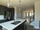 Modern kitchen with stainless steel appliances and island at 1225 E 34Th St # Csw0419, Charlotte, NC 28205