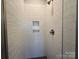 Walk-in shower with subway tile and built-in shelves at 1225 E 34Th St # Csw0419, Charlotte, NC 28205