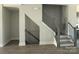 Two staircases in an open floor plan leading to the second floor at 1225 E 34Th St # Csw0419, Charlotte, NC 28205