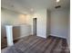 Spacious upper hall with carpeted flooring and access to a bathroom at 1225 E 34Th St # Csw0419, Charlotte, NC 28205