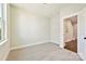 This bedroom offers a view of the staircase at 1227 E 34Th St # Csw0420, Charlotte, NC 28205