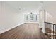 Large bonus room with luxury vinyl plank flooring, a ceiling fan, and lots of natural light at 1227 E 34Th St # Csw0420, Charlotte, NC 28205