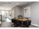 Dining room features modern table, decor, and view of kitchen with lots of natural light at 1227 E 34Th St # Csw0420, Charlotte, NC 28205