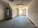 Spacious unfinished garage featuring concrete floors, ample lighting, and plenty of room for storage at 1227 E 34Th St # Csw0420, Charlotte, NC 28205