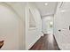Hallway featuring luxury vinyl plank flooring, recessed lighting, and access to the home's upstairs bedrooms at 1227 E 34Th St # Csw0420, Charlotte, NC 28205
