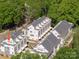 Aerial view of modern townhomes, surrounded by mature trees, highlighting the property's architecture and desirable neighborhood setting at 1229 E 34Th St # Csw0421, Charlotte, NC 28205