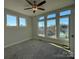 Sun-filled bedroom features multiple windows providing natural light and a comfortable, inviting space at 1229 E 34Th St # Csw0421, Charlotte, NC 28205