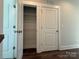 Walk-in closet with ample shelving for organized storage at 1229 E 34Th St # Csw0421, Charlotte, NC 28205