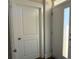Bright entryway showcases modern door and classic interior door for a welcoming feel at 1229 E 34Th St # Csw0421, Charlotte, NC 28205
