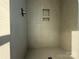 Modern tiled shower featuring built-in shelves and sleek fixtures at 1229 E 34Th St # Csw0421, Charlotte, NC 28205