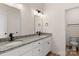 Modern bathroom with double vanity, granite countertop, and stylish fixtures at 1235 Ebinport Rd, Rock Hill, SC 29732