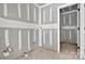 Unfinished bathroom exhibiting rough plumbing and doorway to toilet area at 1235 Ebinport Rd, Rock Hill, SC 29732