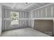 Unfinished bedroom featuring window with view to the outside at 1235 Ebinport Rd, Rock Hill, SC 29732