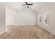 Bright open-concept living room featuring vaulted ceilings, recessed lighting, and wood-look floors at 1235 Ebinport Rd, Rock Hill, SC 29732