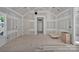 Unfinished living room showcasing high ceilings, window, and doorway at 1235 Ebinport Rd, Rock Hill, SC 29732