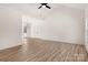 Bright open-concept living room featuring vaulted ceilings, recessed lighting, and wood-look floors at 1235 Ebinport Rd, Rock Hill, SC 29732