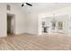 Bright open-concept living room featuring vaulted ceilings, recessed lighting, and wood-look floors at 1235 Ebinport Rd, Rock Hill, SC 29732