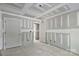 Unfinished room featuring doorways, drywall, and concrete flooring at 1235 Ebinport Rd, Rock Hill, SC 29732
