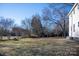 Large backyard with mature trees and open space at 320 Brown Rd, China Grove, NC 28023