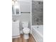Modern bathroom with grey tile and white vanity at 320 Brown Rd, China Grove, NC 28023