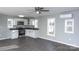 Modern kitchen with white cabinets and stainless steel appliances at 320 Brown Rd, China Grove, NC 28023