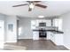 Open concept kitchen with white cabinets and stainless steel appliances at 320 Brown Rd, China Grove, NC 28023