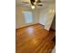 Simple bedroom with hardwood floors and a ceiling fan at 34&20 Shorty Miller Rd, Taylorsville, NC 28681