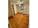 Simple bedroom with wood floors and a mirrored closet door at 34&20 Shorty Miller Rd, Taylorsville, NC 28681