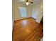 Simple bedroom with hardwood floors and a ceiling fan at 34&20 Shorty Miller Rd, Taylorsville, NC 28681