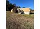 Tan mobile home with wooden steps and satellite dish at 34&20 Shorty Miller Rd, Taylorsville, NC 28681