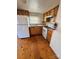 Small kitchen with wood cabinets and white appliances at 34&20 Shorty Miller Rd, Taylorsville, NC 28681