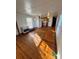 Bright living area with hardwood floors and kitchen access at 34&20 Shorty Miller Rd, Taylorsville, NC 28681