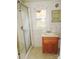 Bathroom with shower, vanity, and butterfly-themed tile at 374 Zion Church Rd, Mount Gilead, NC 27306