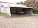 Covered boat storage area next to the workshop building at 374 Zion Church Rd, Mount Gilead, NC 27306