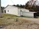 Rear view of workshop, showing AC unit and shed at 374 Zion Church Rd, Mount Gilead, NC 27306