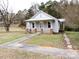 Charming one-story house with a front porch and brick accents at 374 Zion Church Rd, Mount Gilead, NC 27306
