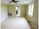 Spacious living room with tile flooring and a view into another room at 374 Zion Church Rd, Mount Gilead, NC 27306