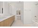 Modern bathroom with light wood cabinets and a soaking tub at 3830 Mill Run, Terrell, NC 28682