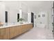 Luxurious bathroom with double vanity and freestanding soaking tub at 3830 Mill Run, Terrell, NC 28682