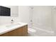 Clean bathroom with white tub and modern vanity at 3830 Mill Run, Terrell, NC 28682
