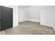 Bright bedroom with sloped ceiling and wood floors at 3830 Mill Run, Terrell, NC 28682