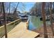 Picturesque waterfront dock with stunning views of the calm lake and boat lifts at 3830 Mill Run, Terrell, NC 28682