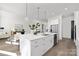 Open concept kitchen with white cabinets and large island with seating at 3830 Mill Run, Terrell, NC 28682