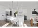 Modern white kitchen with large island and stainless steel appliances at 3830 Mill Run, Terrell, NC 28682