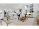 Spacious living room with a white sofa and adjacent kitchen at 3830 Mill Run, Terrell, NC 28682