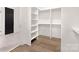 Spacious walk-in closet with built-in shelves and hanging rods at 3830 Mill Run, Terrell, NC 28682