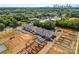 New townhome construction site with Charlotte skyline in the distance, showcasing community development at 4121 Walking Ridge Rd # 54, Charlotte, NC 28208