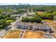 Aerial view of new townhomes showcasing the community layout and proximity to the city at 4121 Walking Ridge Rd # 54, Charlotte, NC 28208