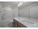 Bathroom featuring double vanity, with tile flooring and a shower-tub combo at 4121 Walking Ridge Rd # 54, Charlotte, NC 28208